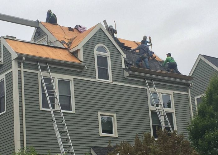 Contractors installing a new roof in Cranston RI